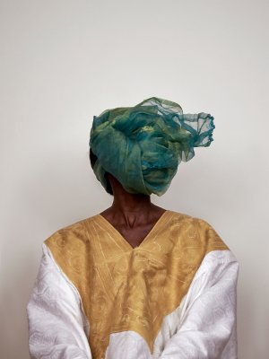 Worn White Grand-Bubu With Golden Embroidery and Green Headscarf, Grey Area
